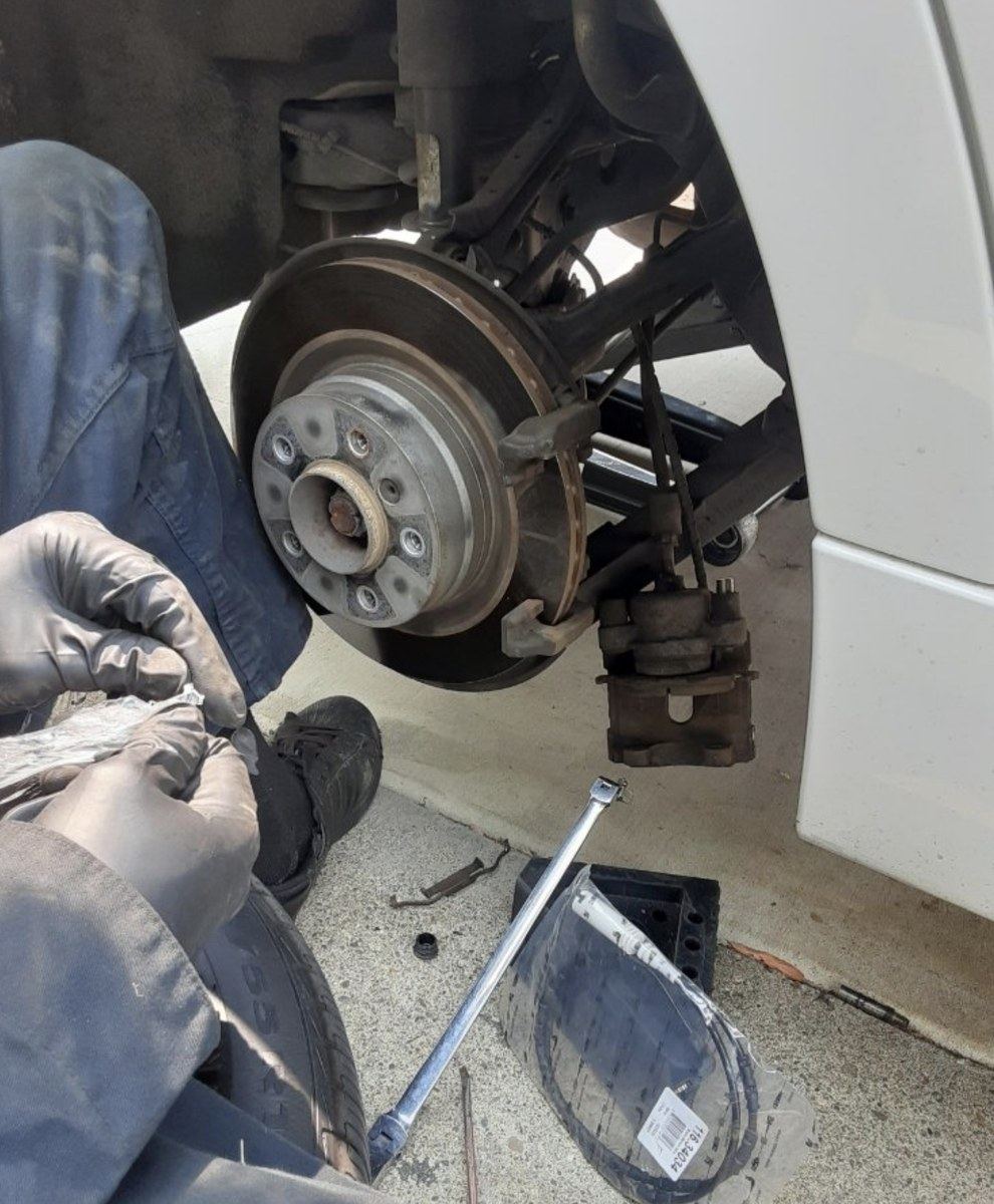 Driveway brake repair in Newport News with the caliper coming off